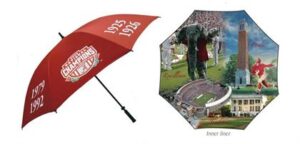 A red umbrella with the words "National Champions 1925, 1926, 1930, 1934, 1941, 1961, 1978, 1979, 1992" on it. The interior is illustrated with various sports scenes, including football players, a stadium, and a campus building.