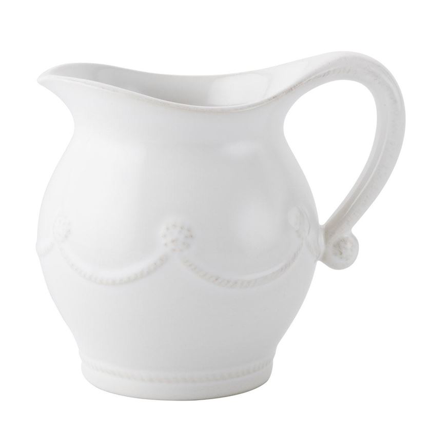 Photo of a white cream pitcher