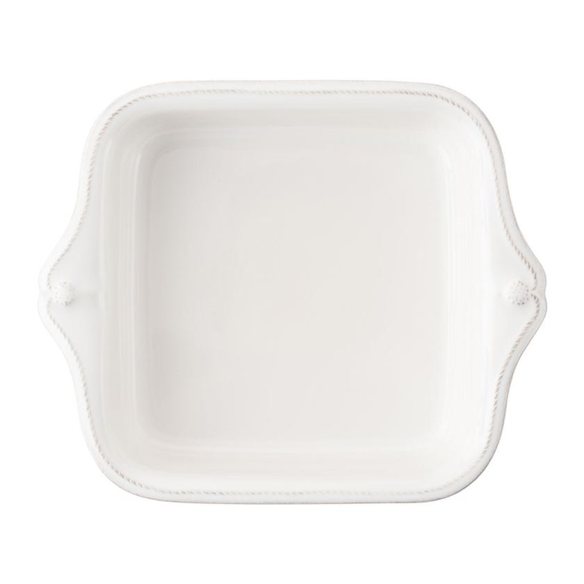 Photo of a white square plate with flared sides