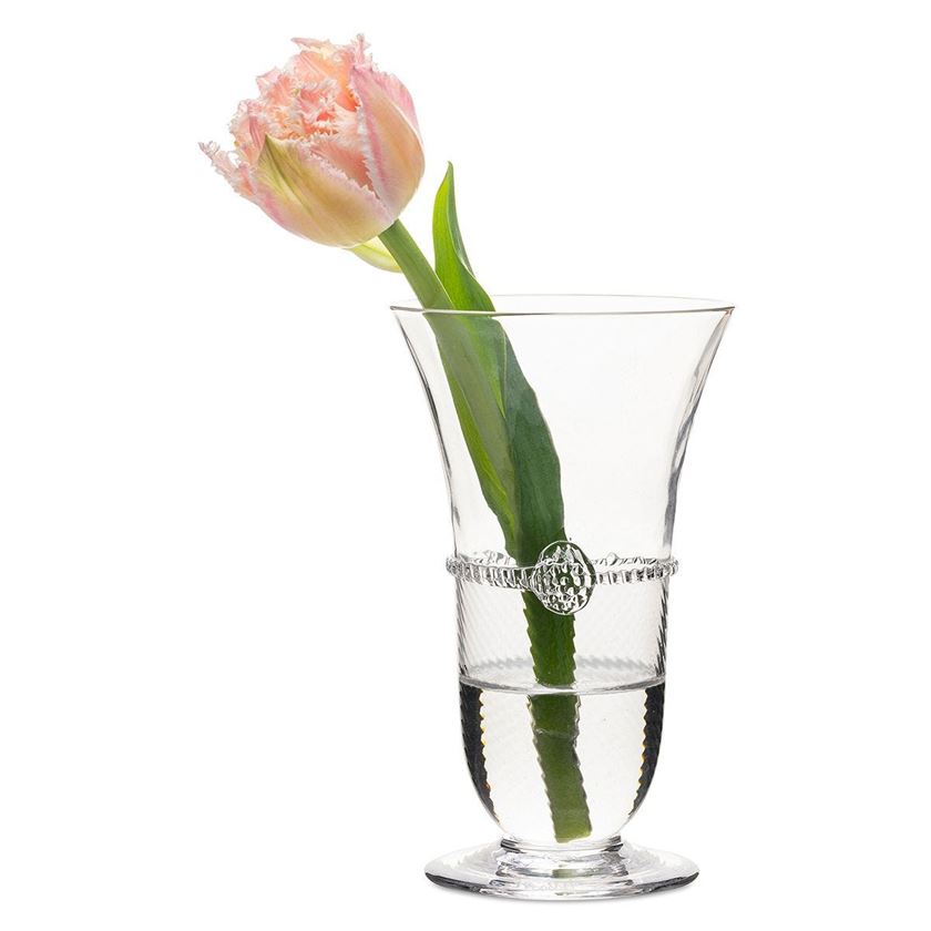 Photo of a clear vase with a flower inside of it