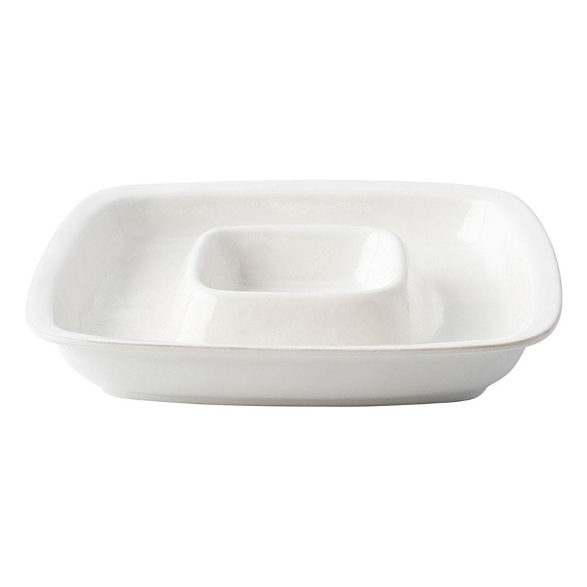 Photo of a white plate with a dipping section in the center for dip
