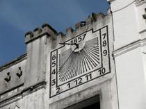 This example of a gnomon is situated on a wall in the heart of Curitiba, Brazil.