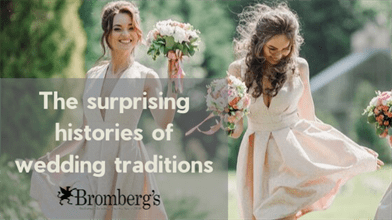 Two women in light-colored dresses are joyfully holding bouquets on a green lawn. The text overlay reads, "The surprising histories of wedding traditions." A logo at the bottom says "Bromberg's" with a floral design.