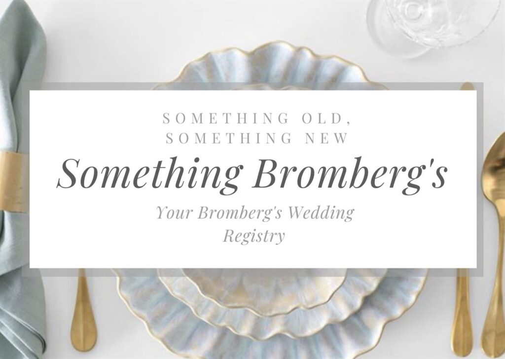 A set table features an elegant place setting with overlapping, scalloped-edged plates, gold flatware, and a folded light green napkin. Text overlay reads: "Something Old, Something New, Something Bromberg's, Your Bromberg's Wedding Registry.