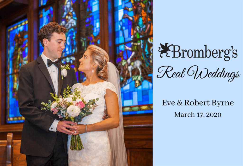 A bride and groom stand in front of a colorful stained-glass window, dressed in wedding attire. The bride holds a bouquet and wears a white gown and veil. Overlay text reads: "Bromberg’s Real Weddings, Eve & Robert Byrne, March 17, 2020.