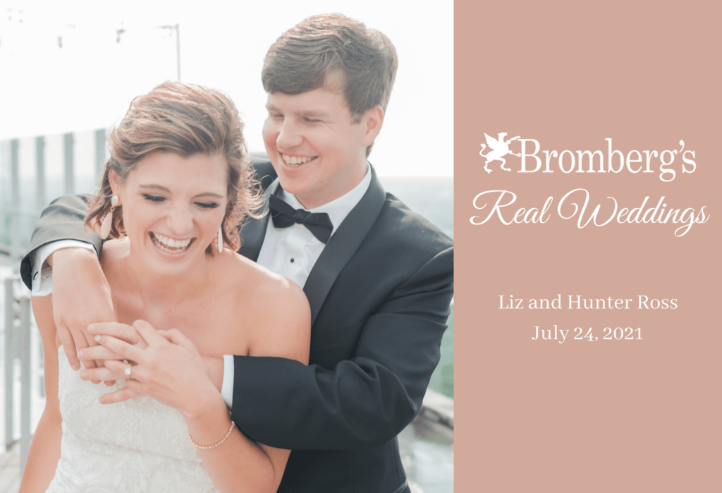 A groom in a black tuxedo hugs his smiling bride from behind. The bride is wearing a white strapless wedding gown with a lace bodice. Text on the right reads "Bromberg's Real Weddings," "Liz and Hunter Ross," and "July 24, 2021.