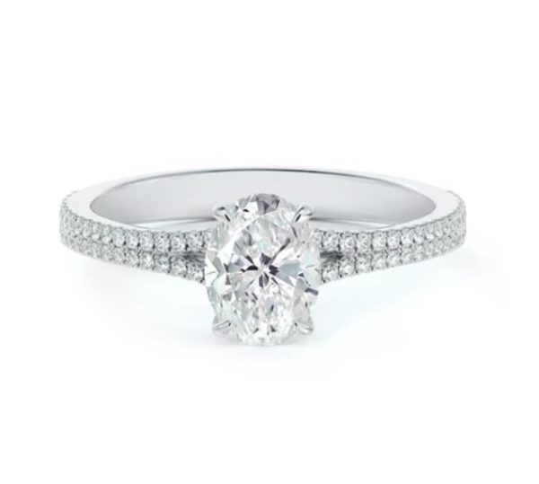 platinum oval engagement ring with two row diamond pave band