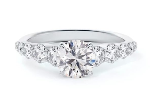 platinum round engagement ring with graduated diamond band sold at Bromberg's