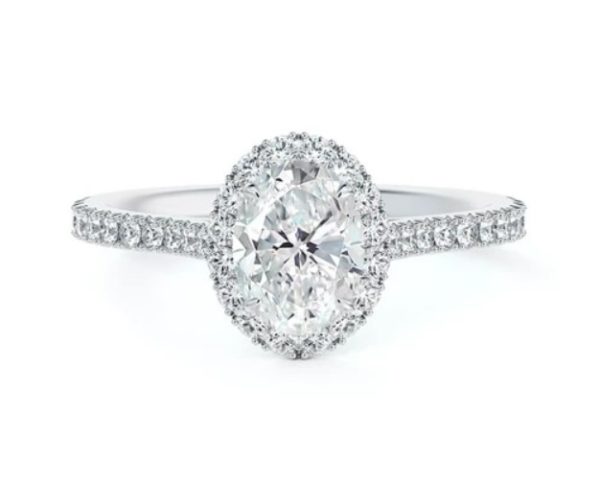 platinum oval halo engagement ring with diamond band