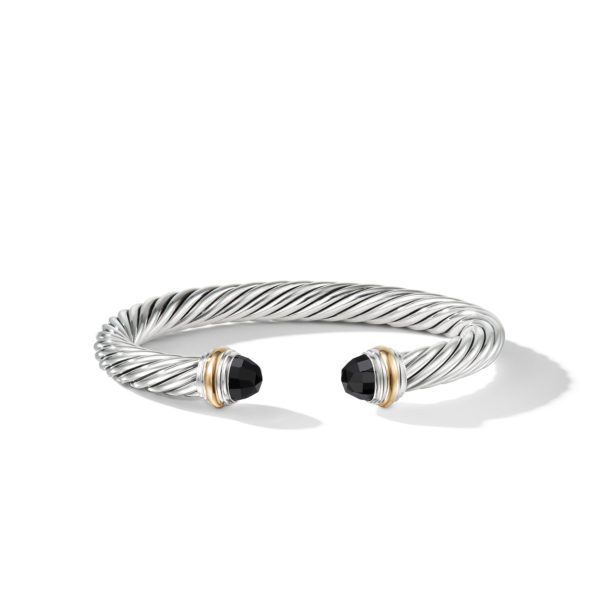 A silver twisted cable bracelet with black gemstone end caps. The bracelet is open-ended and features gold accents near the gemstones. It is displayed on a plain white background.