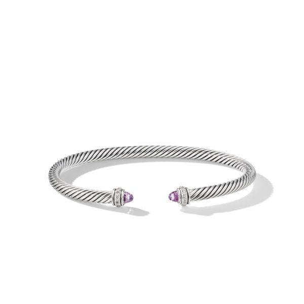 A silver twisted cable-style cuff bracelet with open ends, each end adorned with a small purple gemstone and diamond accents. The bracelet is presented against a plain white background casting a subtle shadow.