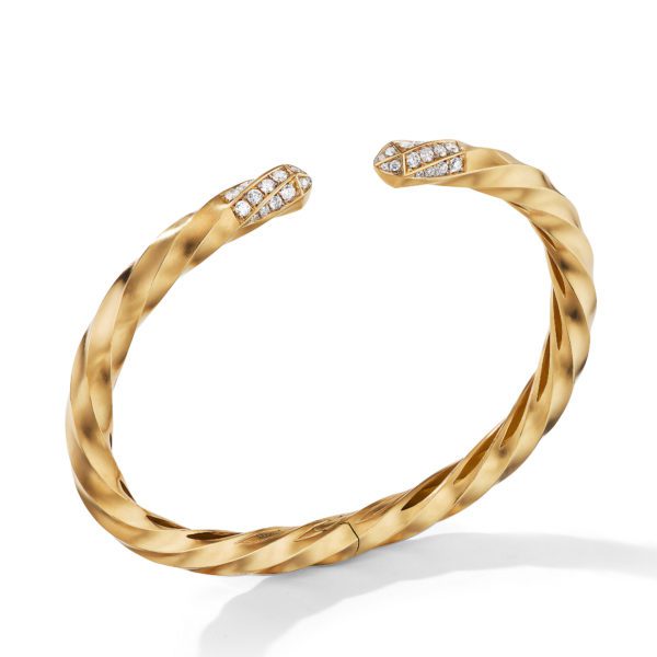 A gold twisted rope bangle with an open design. The tips of the bangle are adorned with embedded small diamonds, adding a touch of sparkle to the elegant piece. The bangle is presented on a simple white background.