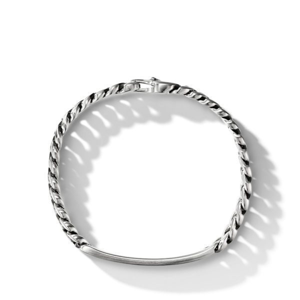 A sterling silver bracelet with a twisted rope design and a smooth bar section at the front. The bracelet has a clasp closure and is photographed on a white background, casting a soft shadow.