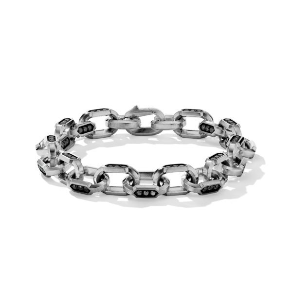 A silver-toned bracelet featuring large, interconnected rectangular links with small dark accents in the middle of each link. The bracelet has a robust, industrial appearance and lies against a white background.