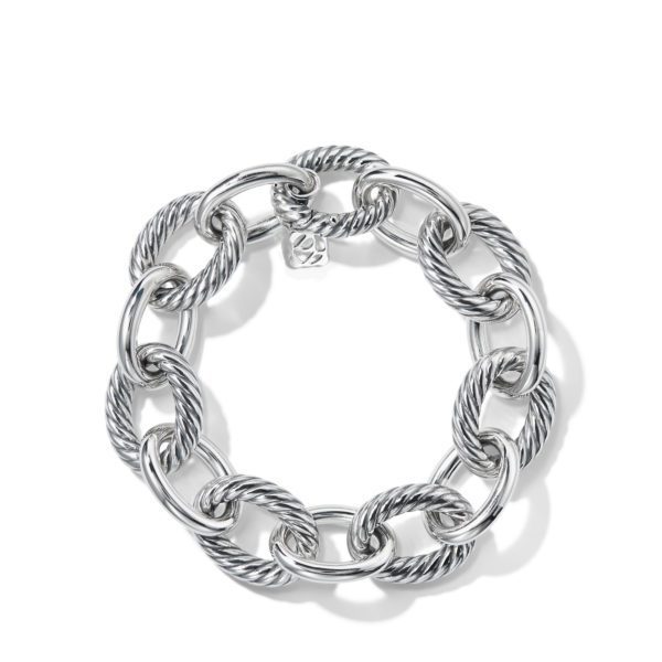 A silver bracelet featuring large, interlocking twisted rope chain links with a small square charm engraved with "925." The bracelet is arranged in a circular shape against a white background.