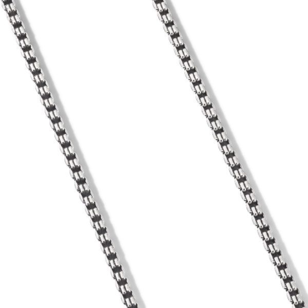 Close-up view of two parallel metal chains, each featuring an interwoven pattern with alternating shiny and matte links, against a white background. The chains are uniform in thickness and appear to be part of a jewelry piece, such as a necklace.