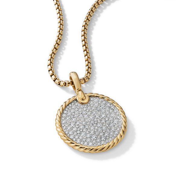 A gold chain necklace with a round pendant encrusted with numerous small, sparkling diamonds. The pendant has a twisted gold border and a shiny bail attaching it to the chain. The necklace is displayed against a white background.