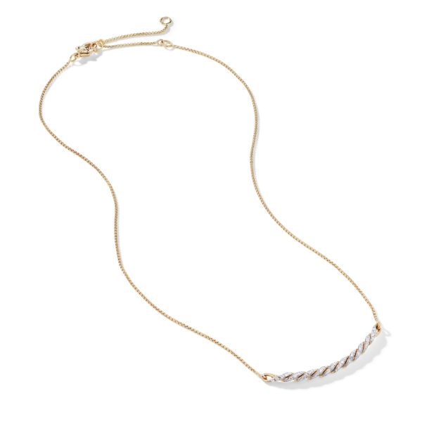 A delicate gold necklace with a thin chain and an adjustable clasp. The pendant is a small bar encrusted with tiny diamonds arranged in a twisted pattern, combining white and gold elements. The necklace is elegantly minimalist in design.