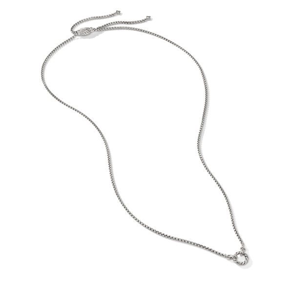 A delicate, silver chain necklace is displayed against a plain white background. The necklace features a small, circular clasp at the center, designed to fasten or attach a pendant.