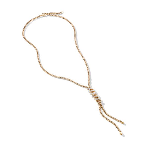 A delicate gold chain necklace with a knot design in the center, and two tassel-like chain ends hanging below the knot. The chain features small, uniform links and a gold clasp. The jewelry is set against a plain white background.