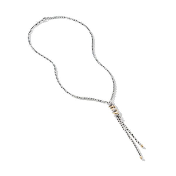 A silver chain necklace featuring a unique design with two dangling pendants. The chain has a delicate interlocking pattern, and each pendant is adorned with small beads and metallic accents, providing an elegant and sophisticated look.