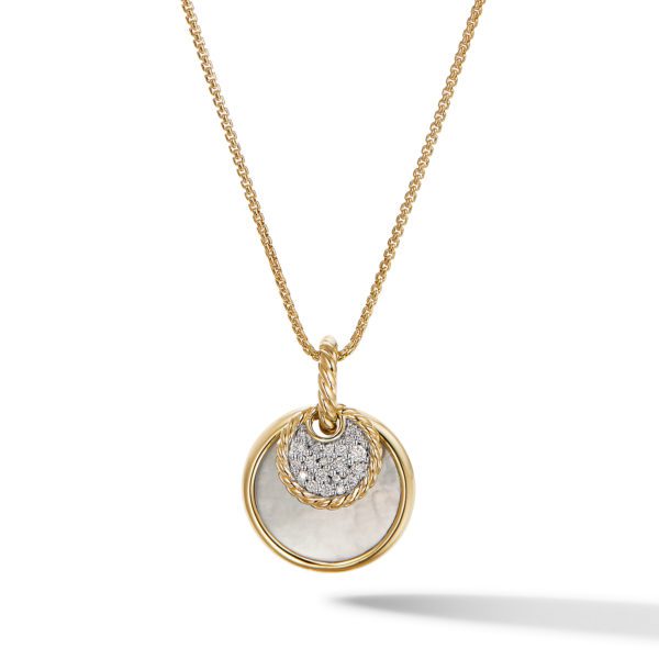 A gold necklace with a delicate chain, featuring a pendant composed of two circular elements. The smaller, upper circle is silver with a textured surface, while the larger, lower circle is smooth with a gold rim and a white center, creating a layered effect.