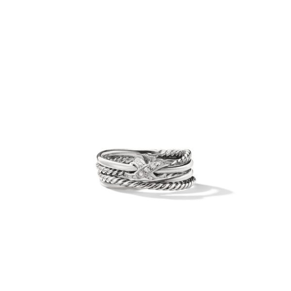 A silver ring with intricate twisted rope-like bands and a central design featuring small embedded gemstones. The ring has a layered appearance with varying textures, giving it a sophisticated and elegant look. The white background highlights the ring's details.