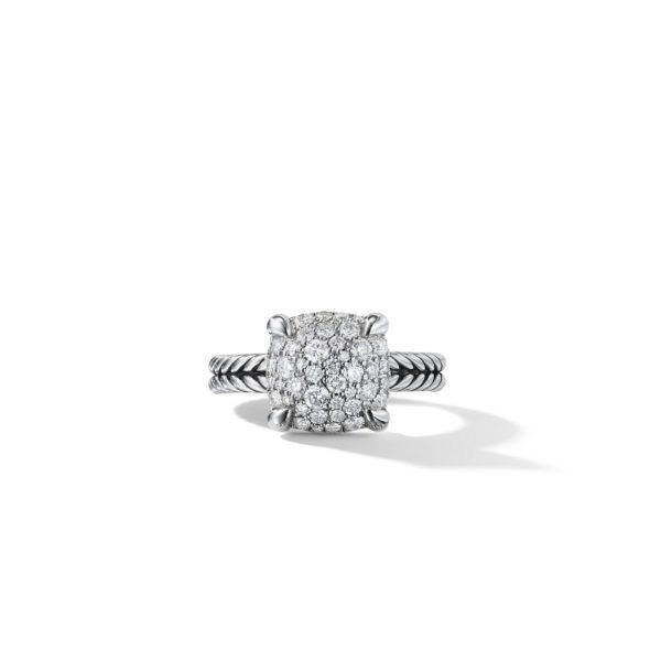 A silver ring with a cushion-shaped cluster of small diamonds set in a square setting. The band features a twisted rope design. The ring is displayed against a white background with a shadow cast to the right.