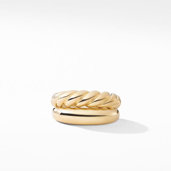 Two gold rings are displayed against a white background. The upper ring features a twisted rope design, while the lower ring has a smooth, simple band. Both rings are brightly polished, reflecting light to showcase their shiny surfaces.