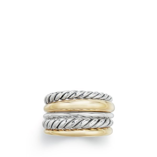 A gold band and a silver twisted band intertwined to form a dual-toned ring, with the silver bands encircling the gold in a repeating pattern. The ring has a polished finish and reflects light, creating a sleek and elegant appearance.