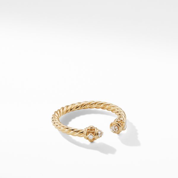 A gold twisted cable bracelet with diamond-encrusted end caps. One end has a circular setting with a central diamond surrounded by smaller diamonds, while the other end features a similar design with intricate metallic detailing. The bracelet sits on a white background.