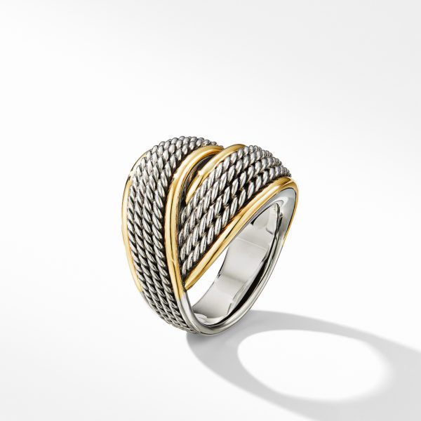 A stylish ring with a contemporary design featuring intertwined silver and gold bands against a white background. The silver bands have a textured, twisted rope appearance, contrasted by smooth, polished gold accents. The ring casts a shadow below it.