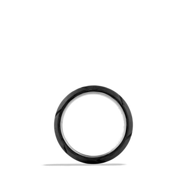 A simple, round, black ring displayed on a white background. The ring has a smooth, glossy finish and casts a subtle shadow underneath. There are no additional markings or designs on the ring.