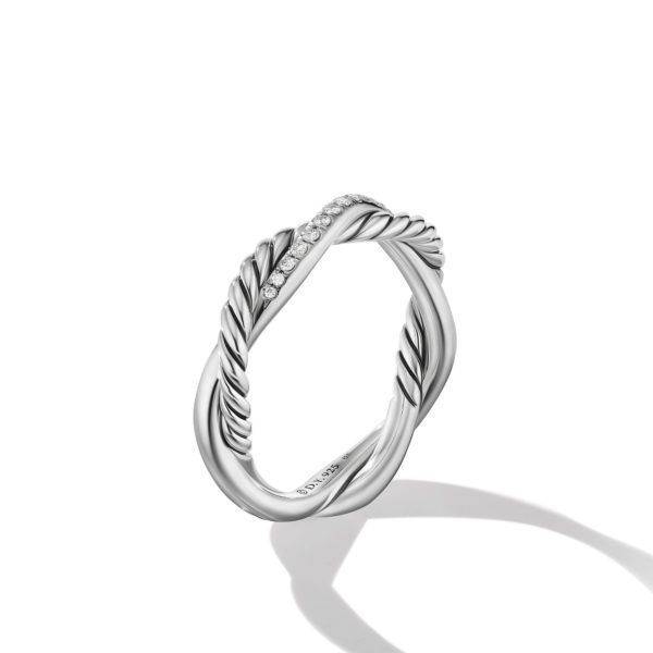 A silver twisted rope ring featuring a band of small, sparkling diamonds on one section. The ring casts a soft shadow on the white background.