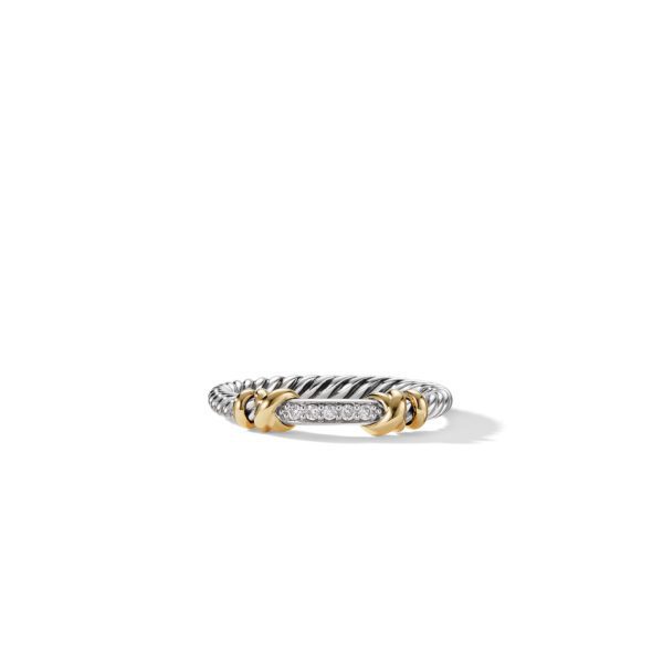 A silver twisted cable ring with a rectangular center set with small diamonds. The center is held by two gold accents on either side. The ring is positioned on a white background with a shadow beneath.