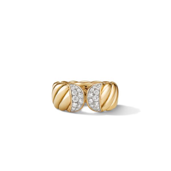 A gold ring features two twisted sections with a set of diamonds in the center. The diamonds are arranged in two symmetrical, crescent-shaped patterns, adding an elegant sparkle to the piece. The ring has a smooth, polished finish and casts a slight shadow.