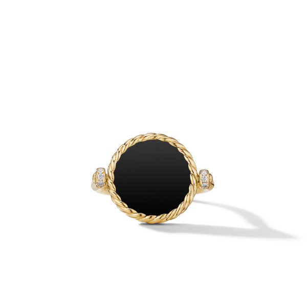 A gold ring featuring a large, round black onyx stone at its center. The stone is surrounded by a twisted gold rope design. Each side of the band is adorned with small, sparkling diamonds. The background is plain white, highlighting the ring.