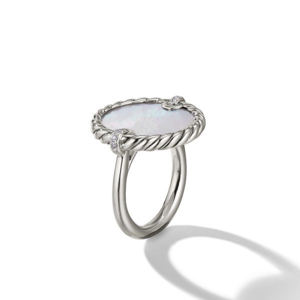 A silver ring with an oval-shaped white gemstone set horizontally. The gemstone is framed by a twisted silver rope design and accented with small diamonds at the top and bottom. The ring casts a soft shadow on a white background.