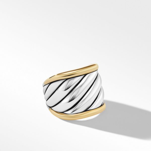 A stylish ring featuring a twisted design of intertwined white and black segments, bordered by gold accents on the top and bottom edges. The ring is displayed against a plain white background, casting a subtle shadow to the right.