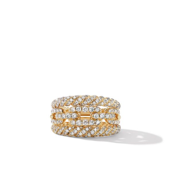 A gold ring with multiple rows of interwoven, sparkling diamonds set throughout the band, creating a luxurious, intricate pattern. The ring is shown on a white background with a soft shadow beneath.