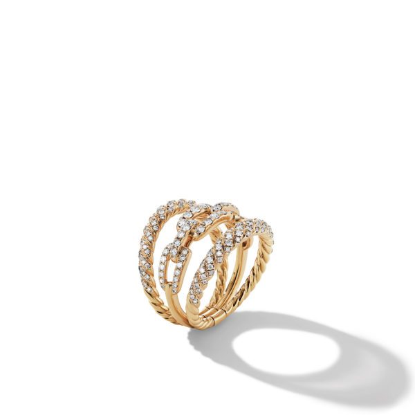 A gold ring with three intertwined bands, each adorned with sparkling gemstones and intricate details. The design includes a mix of smooth and textured surfaces, creating an elegant and sophisticated piece. The image is set against a plain white background.