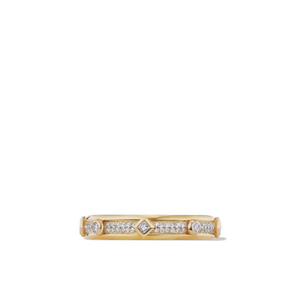 A gold ring featuring a row of small diamonds and three larger circular diamonds set between geometric shapes along the band. The design is intricate and elegant, with a luxurious and classic appearance. The background is plain white.