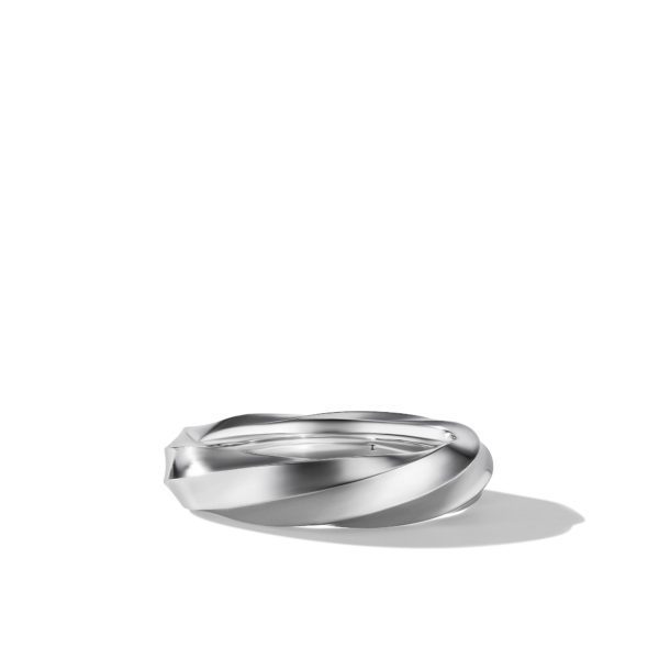 A sleek, modern silver bracelet against a plain white background. The bracelet has a twisted design, creating a dynamic and elegant appearance. Simple shadowing is visible at the base.