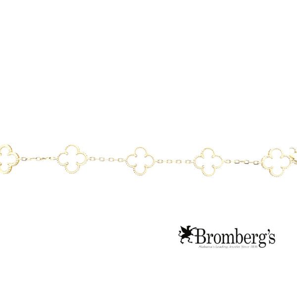 Introducing the Quatrefoil Mother-of-Pearl Station Bracelet, a delicate piece showcasing a repeating pattern of clover-shaped links. The "Bromberg's" logo is elegantly placed in the bottom right corner.