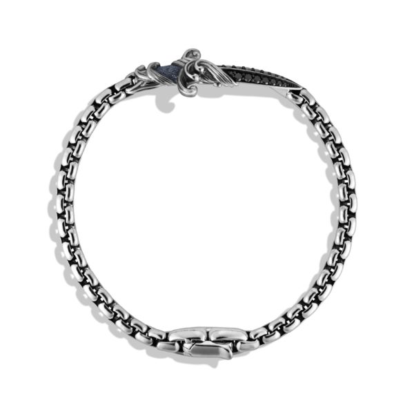 A silver chain bracelet featuring rectangular links and a decorative clasp with intricate detailing. The bracelet is displayed on a white background, casting a minimal shadow, highlighting its craftsmanship and elegance.