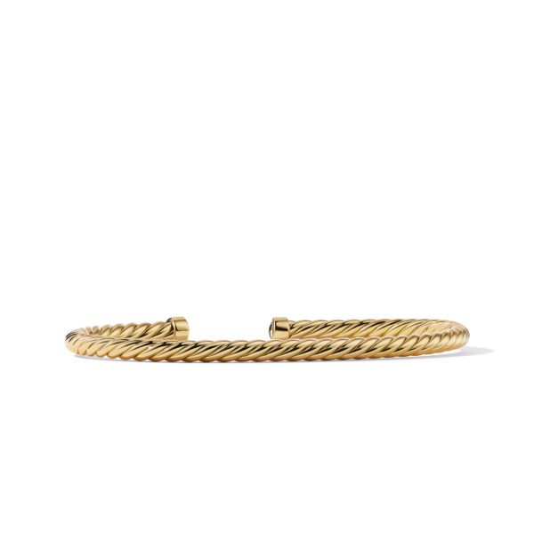 A gold twisted rope cuff bracelet with an open design, shown against a white background. The bracelet has a polished finish and no additional embellishments.