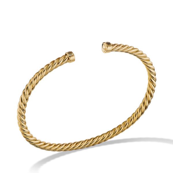 A gold twisted rope-style open cuff bracelet with smooth, rounded ends. The bracelet has a polished, shiny finish and casts a shadow on a white background.