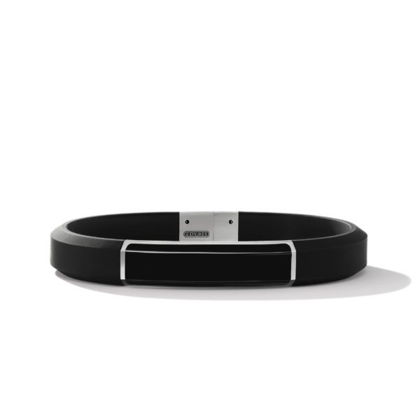 A sleek, modern black bracelet with a rectangular, glossy display screen in the center. The band is curved and has a minimalist design, featuring a silver clasp with subtle detailing. The bracelet is set against a white background.