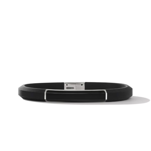 A sleek black leather belt with a rectangular silver buckle is displayed against a white background. The buckle has minimalistic design elements, creating a modern and sophisticated look. The shadow cast beneath the belt adds depth to the image.