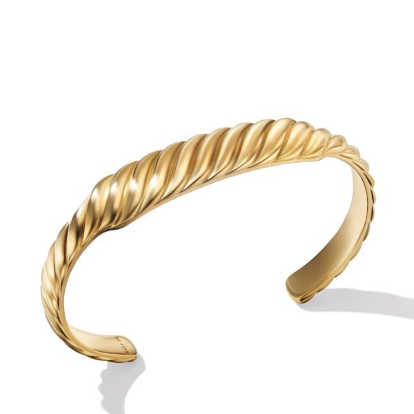 A gold bracelet with a twisted, rope-like design. The bracelet is open-ended and appears to be made of polished metal, casting a soft shadow on the white background.